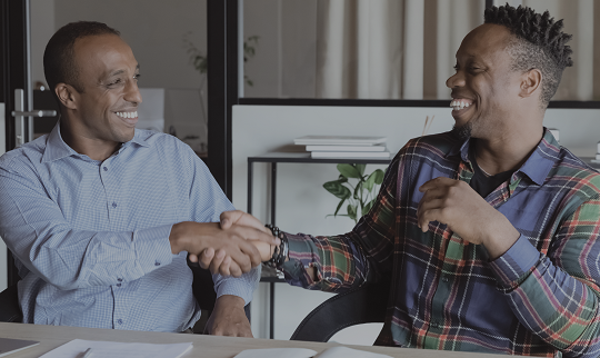 two men shaking hands