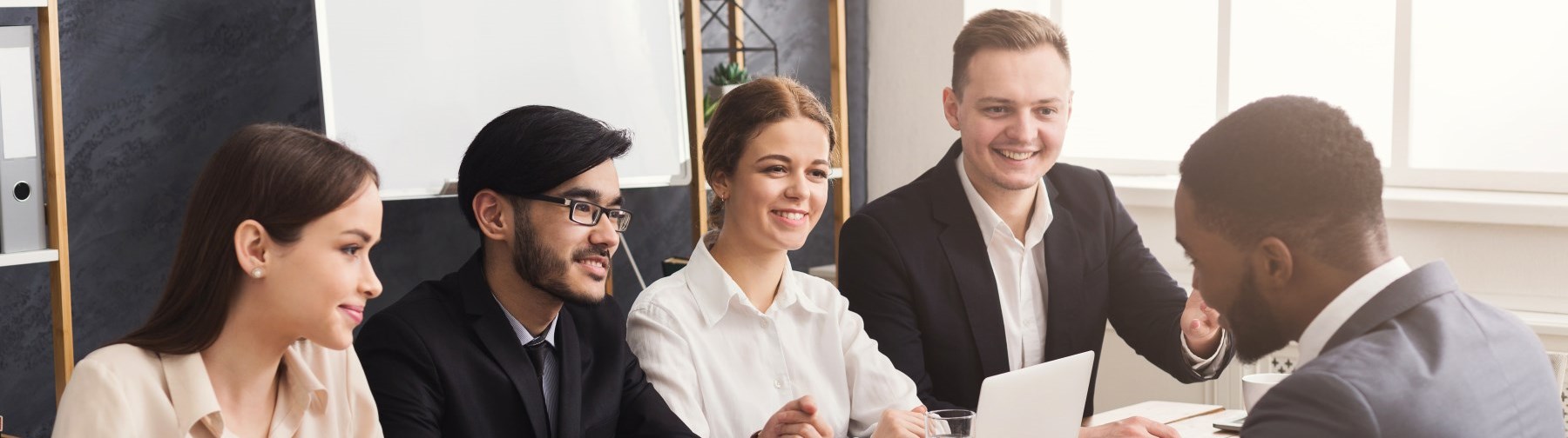 Team of young professionals meeting