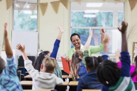 Teacher leads students in class