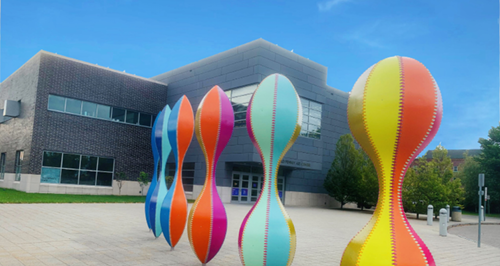 exhibit in front of the Burchfield Penney Art Center featuring colorful tubular sculptures