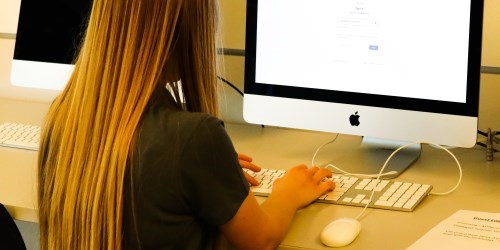 student working on a computer