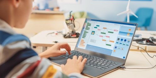 student using a laptop computer