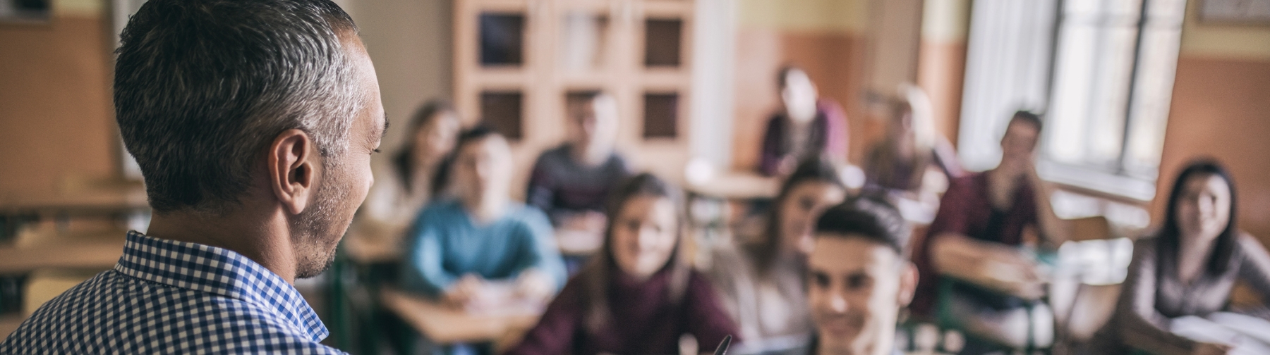 Teacher teaching students