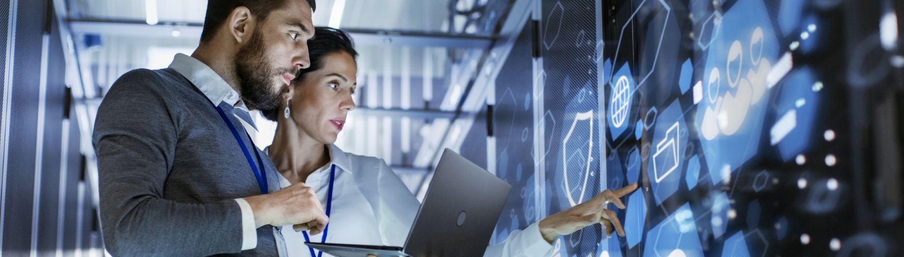 People interacting with holographic data