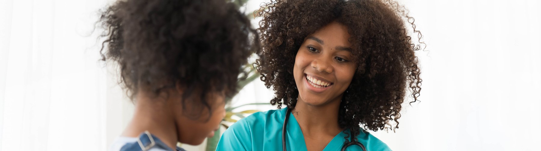 female school nurse working with a student